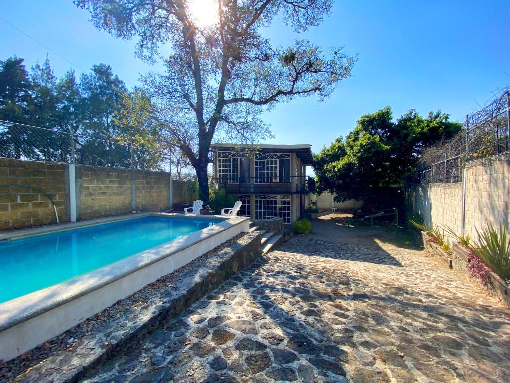 Casa Encino con alberca climatizada en Tepoztlán