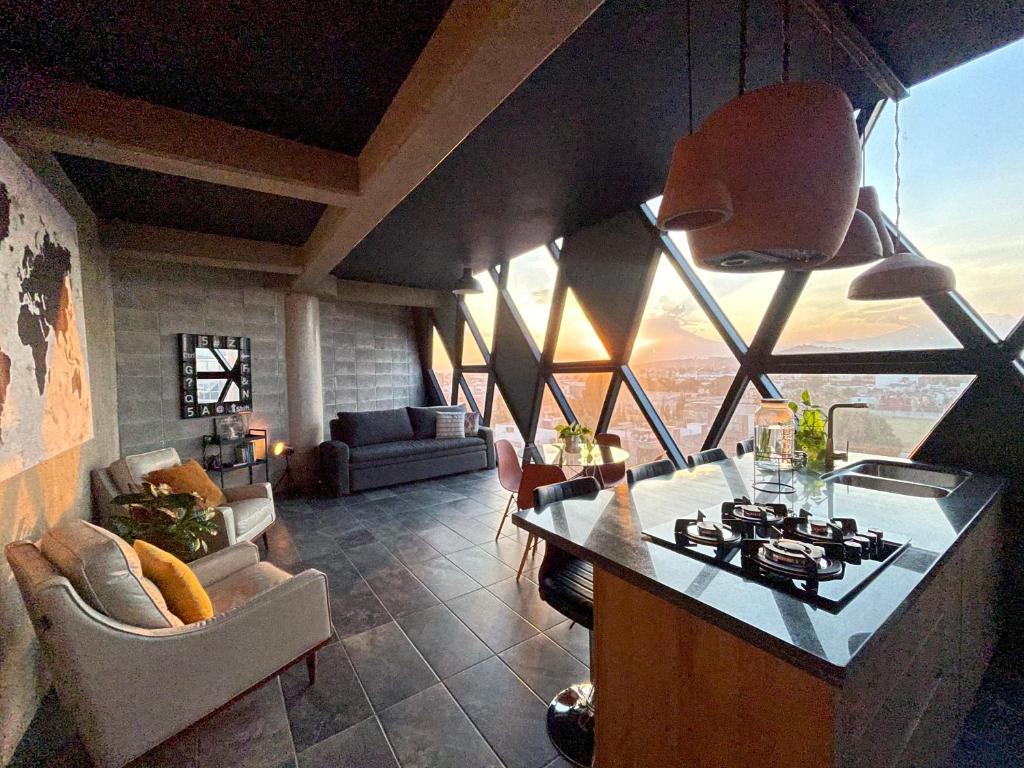 Loft industrial vista a los volcanes